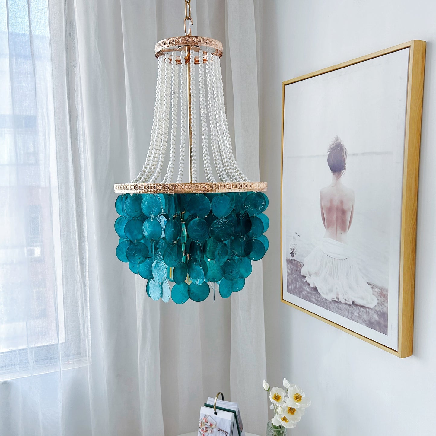 Cascading 2 tier shell chandelier with pearl accents perfect for foyer and dining room
