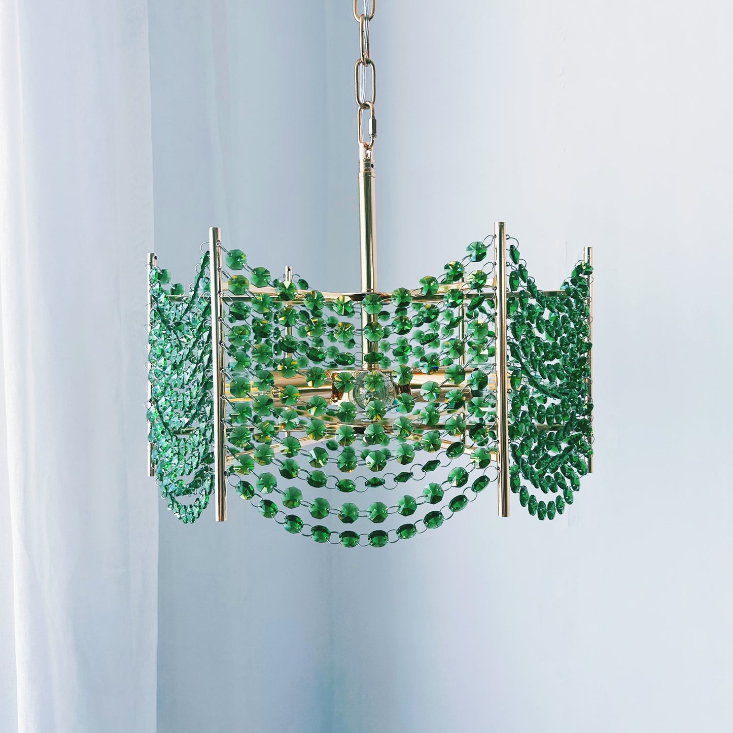 Chandelier with green gemstones 