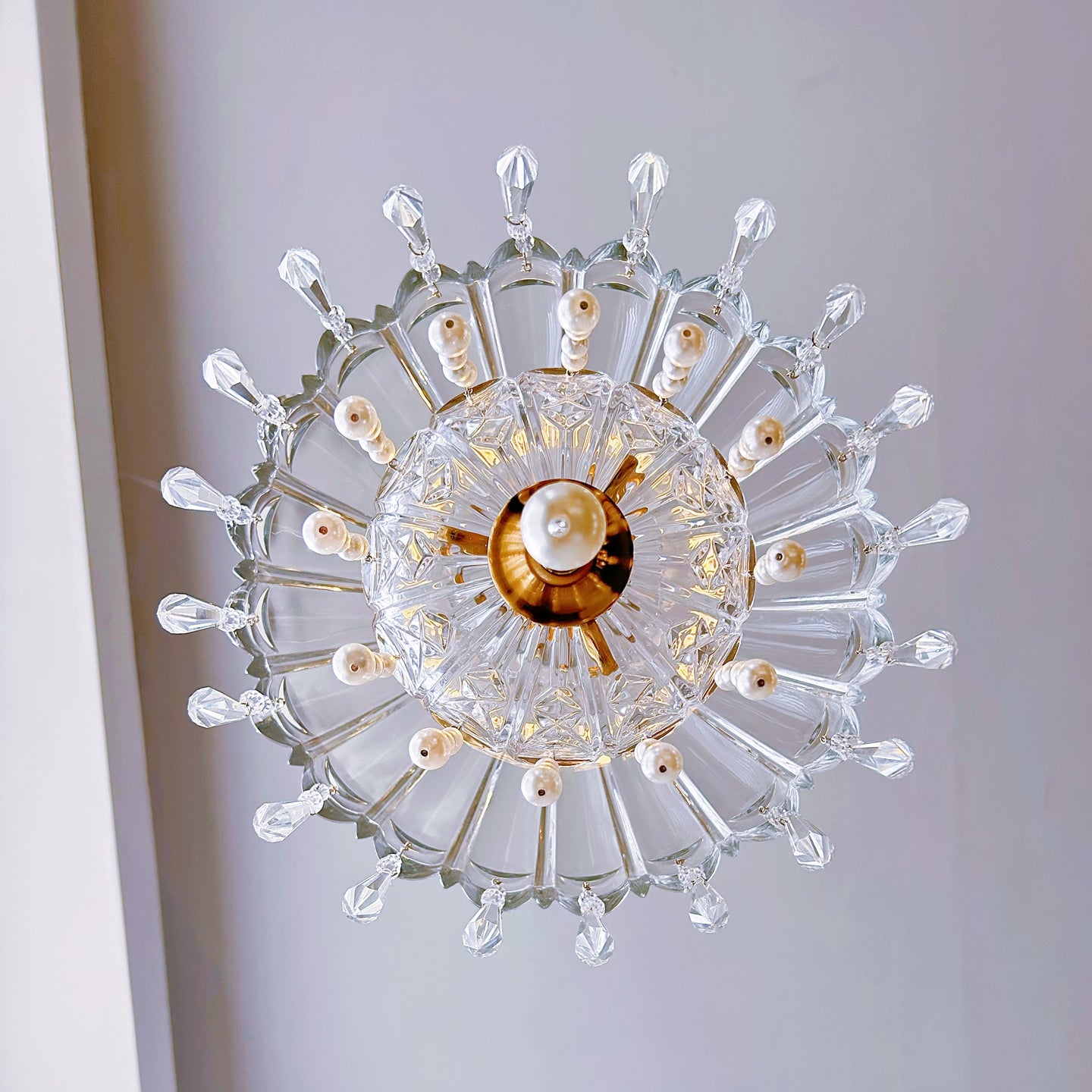 Modern brass and crystal pendant perfect for kitchen island breakfast nook and entryway