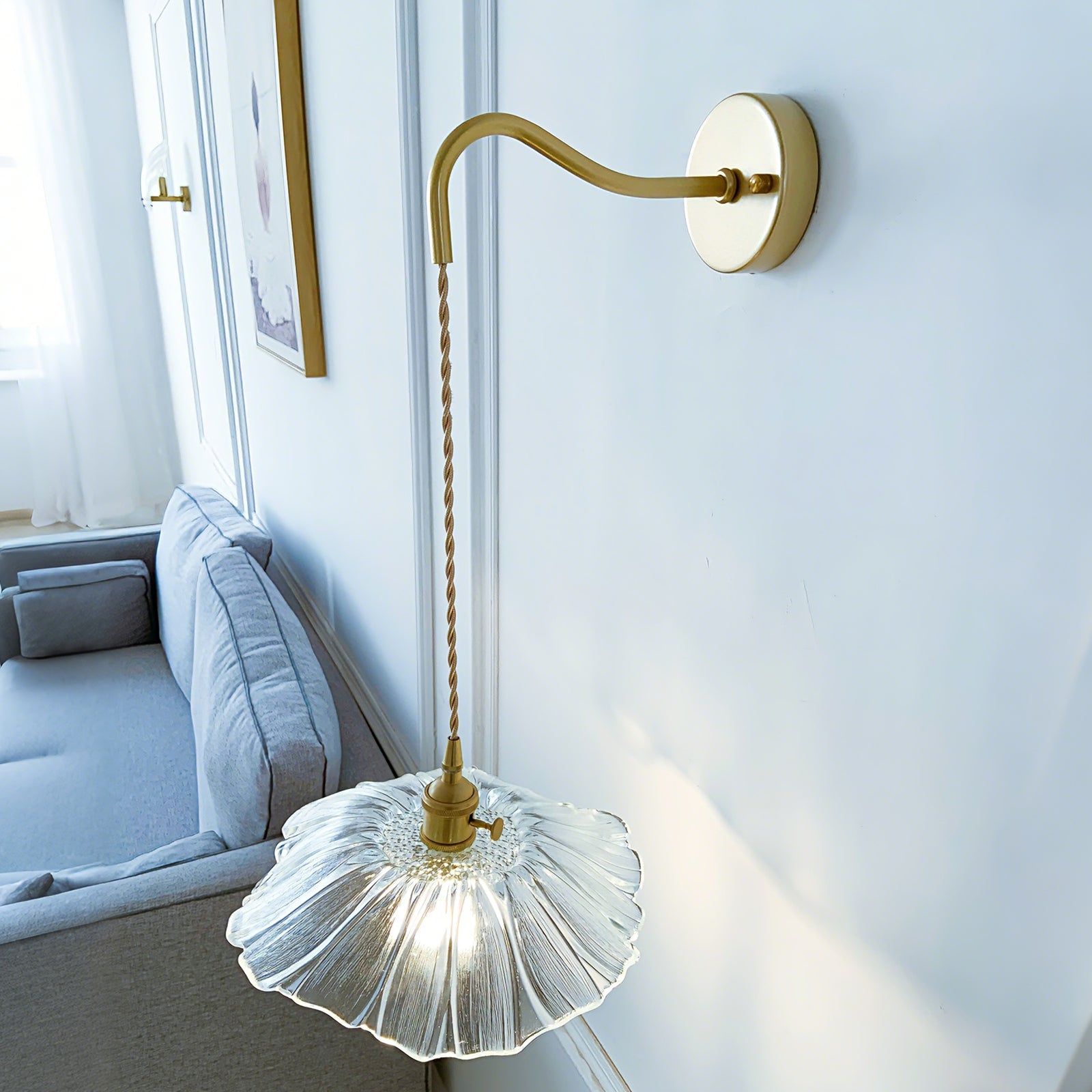 Modern brass wall light with double glass shades perfect for bathroom mirror lighting
