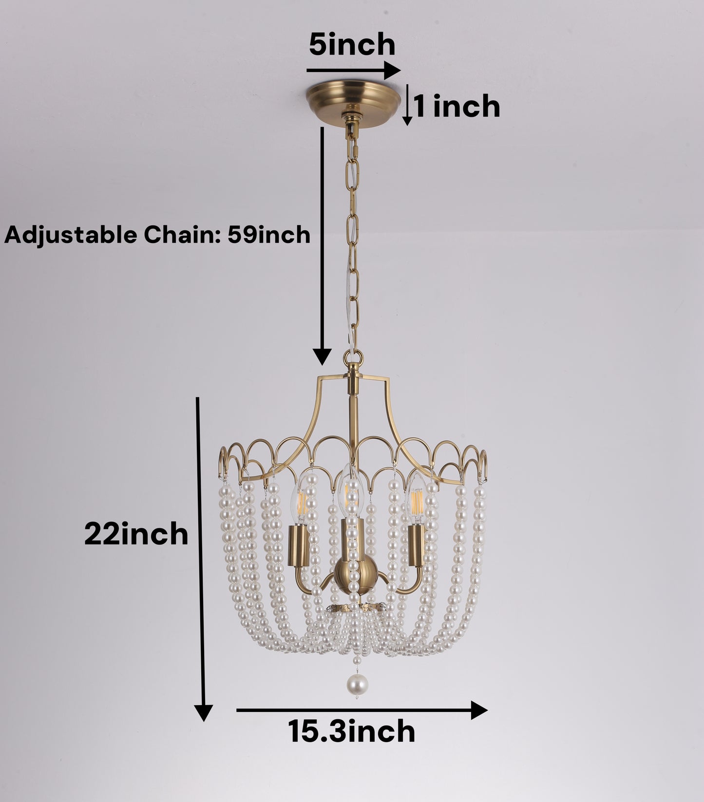 Close up of handcrafted 3 light chandelier showing gold finish and natural pearl details