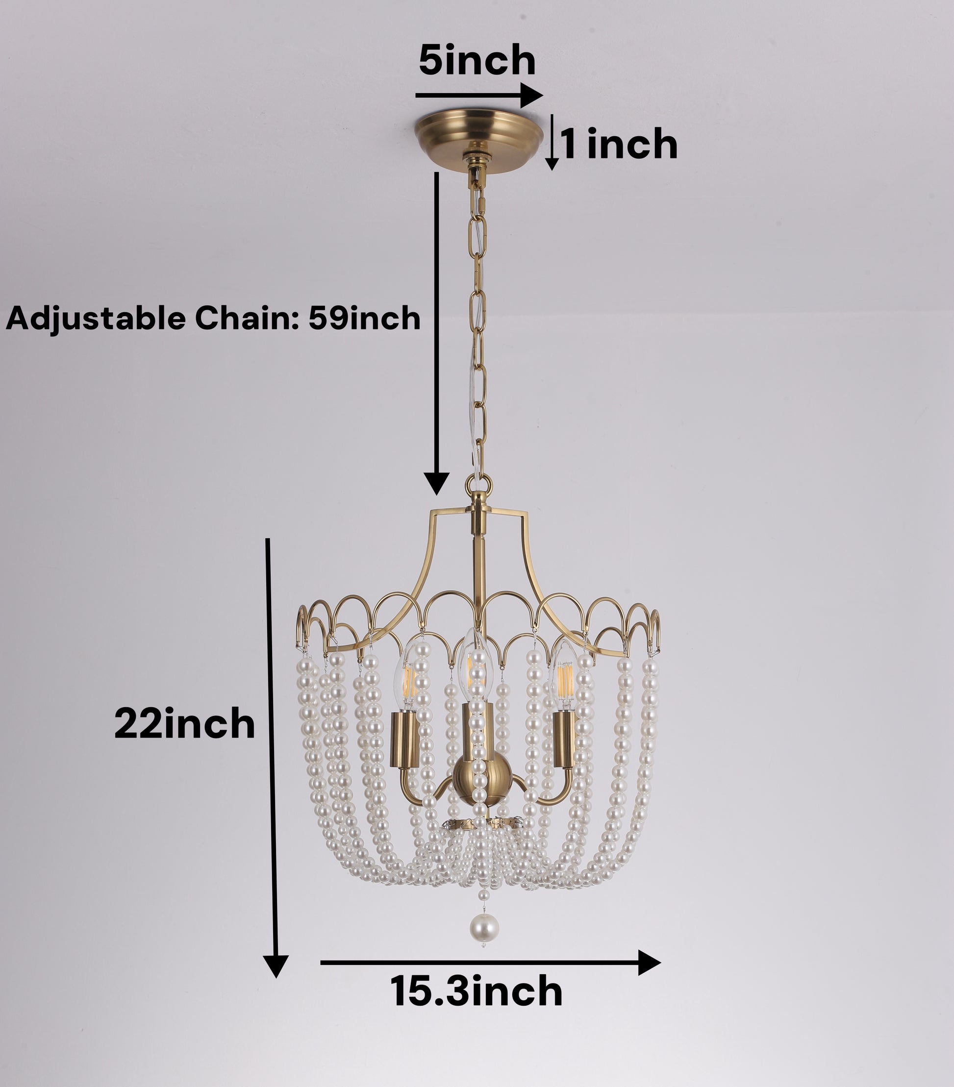 Close up of handcrafted 3 light chandelier showing gold finish and natural pearl details