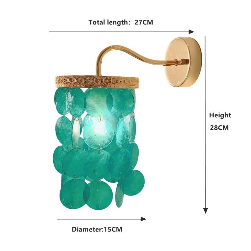 Ocean blue shell wall light close up showing natural capiz shells and brass details