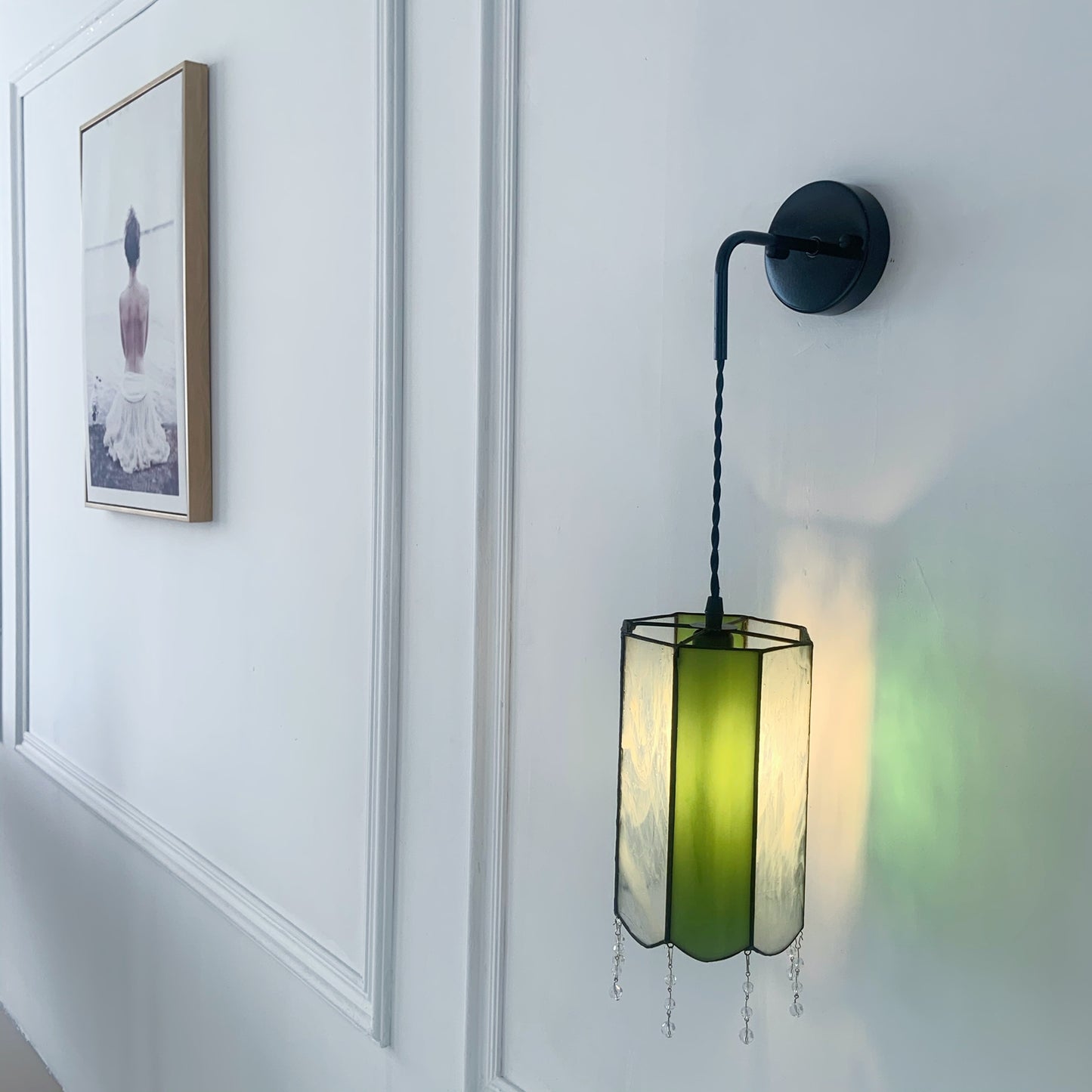 Bohemian stained glass sconce close up showing handcrafted multicolor glass details