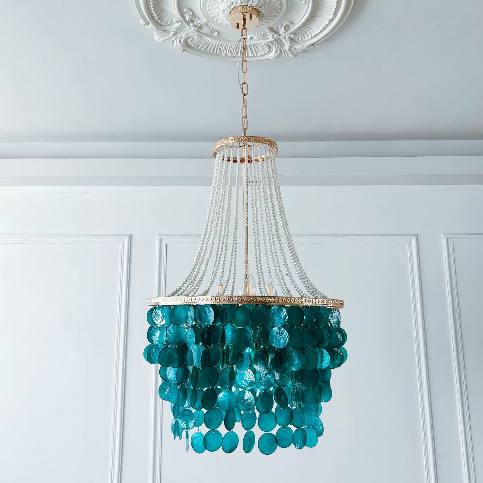 Statement 8 light shell chandelier with ocean blue mother of pearl perfect for high ceilings