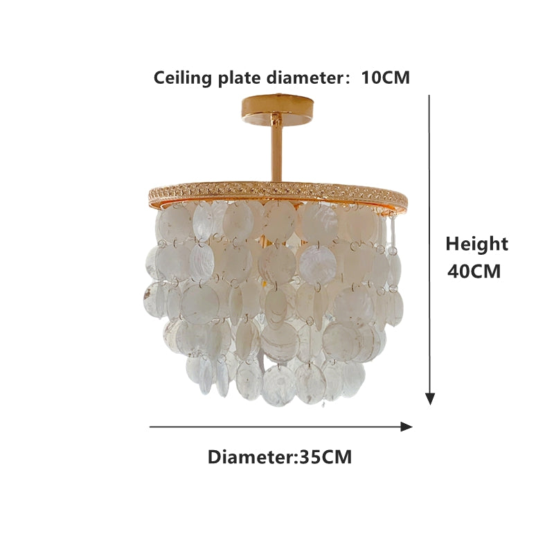 Coastal semi flush chandelier close up showing handcrafted blue capiz shell details