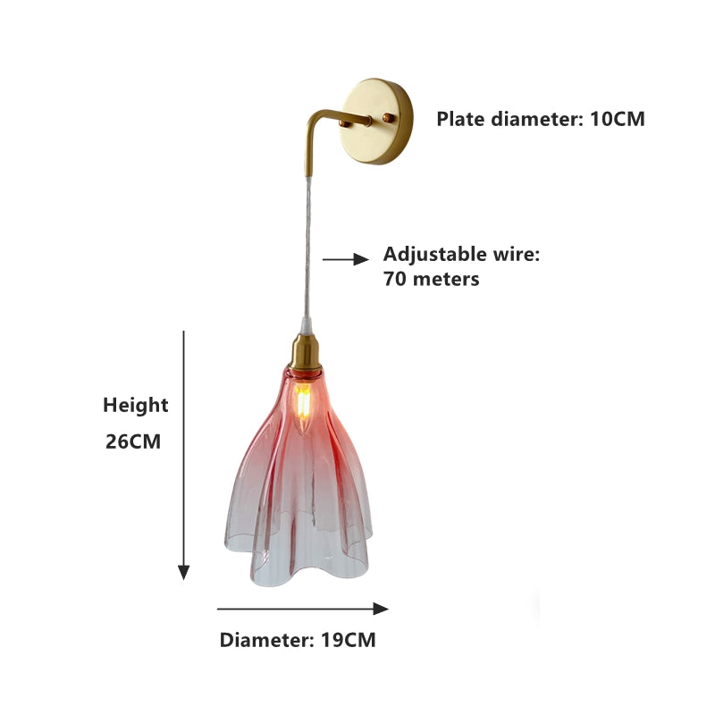 Art deco pink glass wall light with ruffled shade perfect for bathroom and powder room