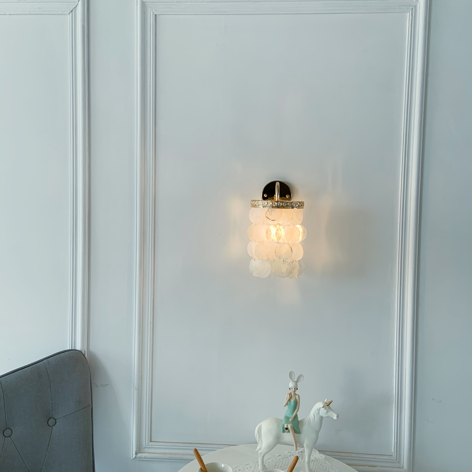 Coastal seashell wall sconce with mother of pearl perfect for bathroom vanity and bedroom