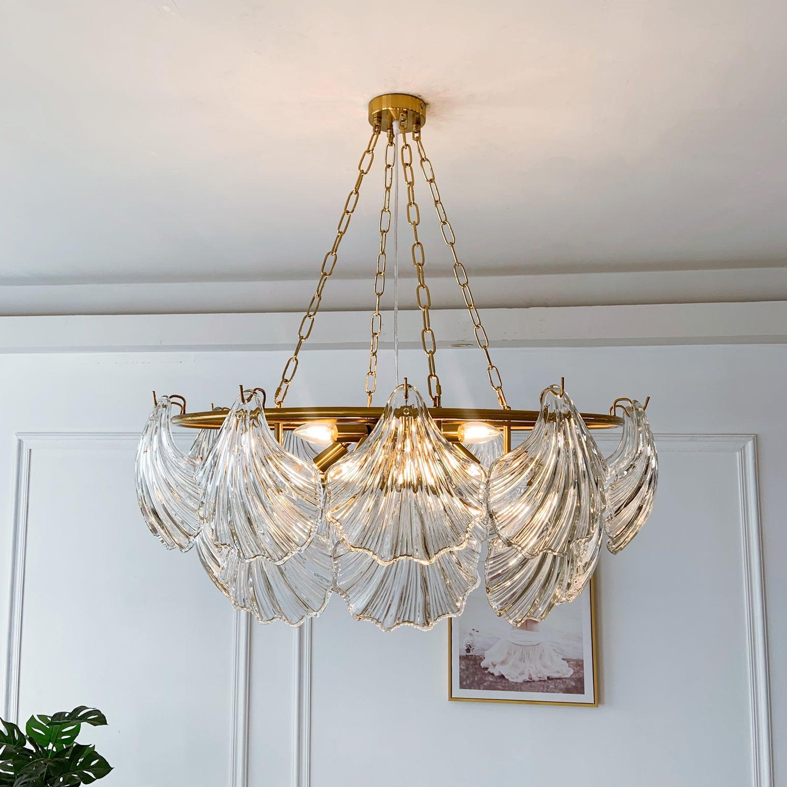 Chandelier with glass shades and gold fixture