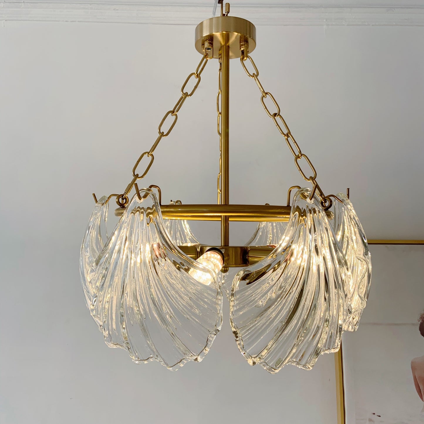 Gold chandelier with clear glass shades