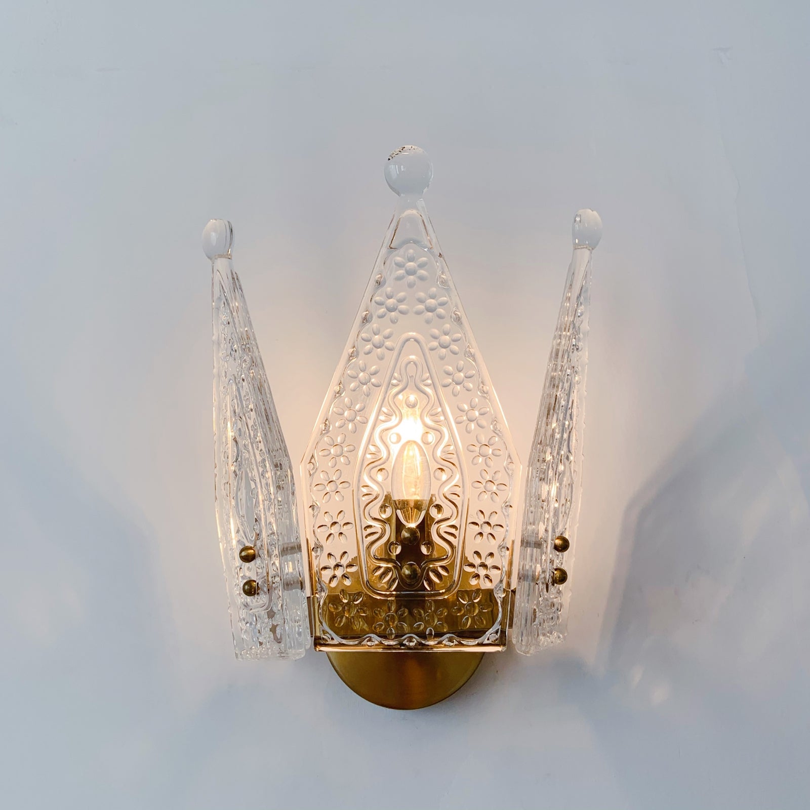 Luxury brass crown wall sconce with glass shade - handcrafted Art Deco lighting fixture