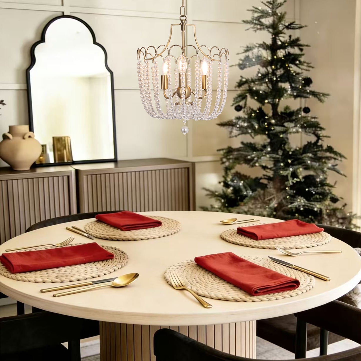 Small gold chandelier decorated for Christmas perfect for holiday dining room decor