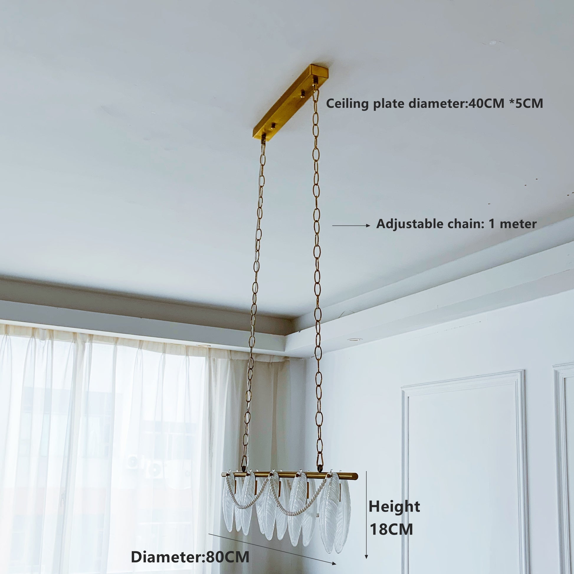 Chandelier with measurements labeled on a white ceiling