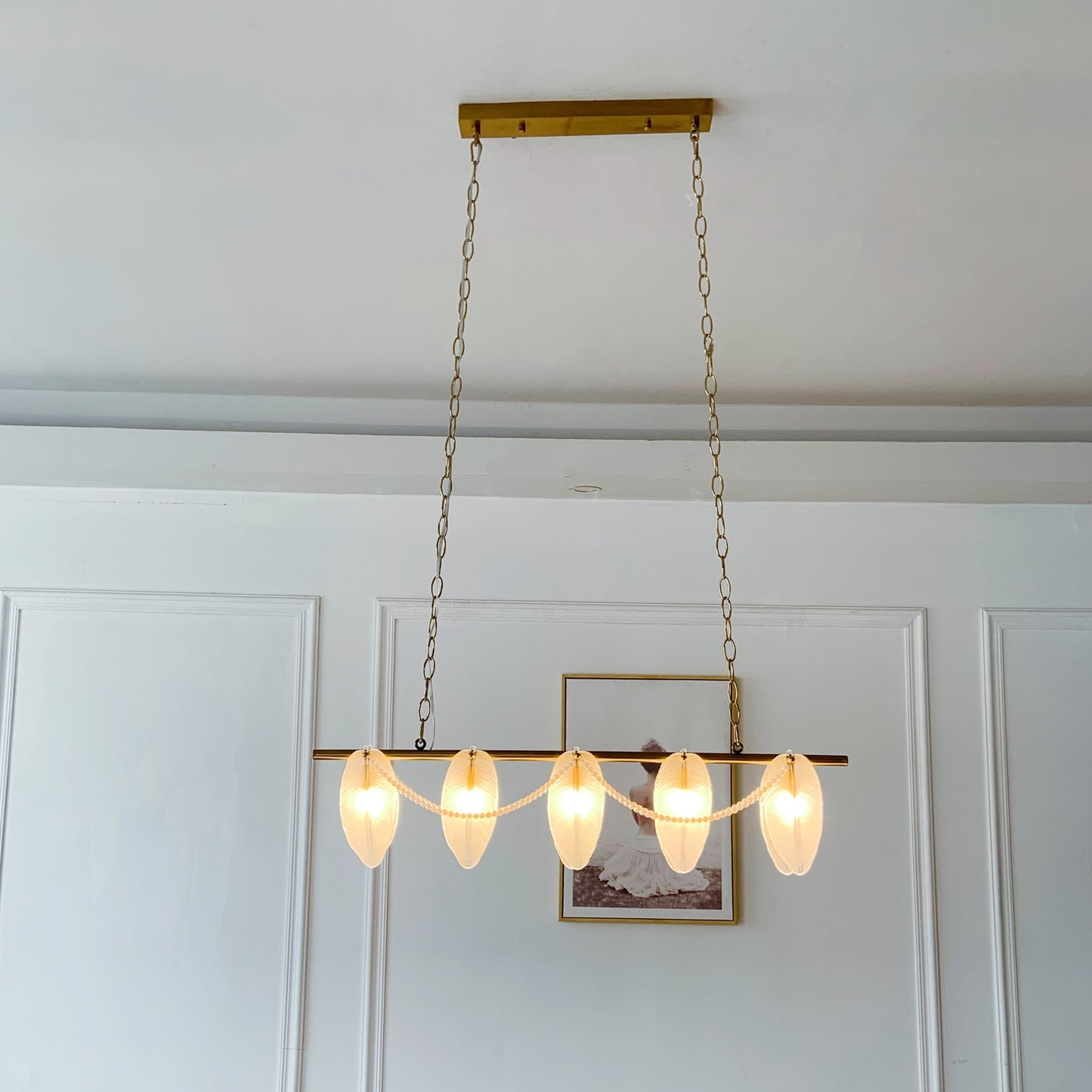 Modern pendant light fixture hanging from the ceiling