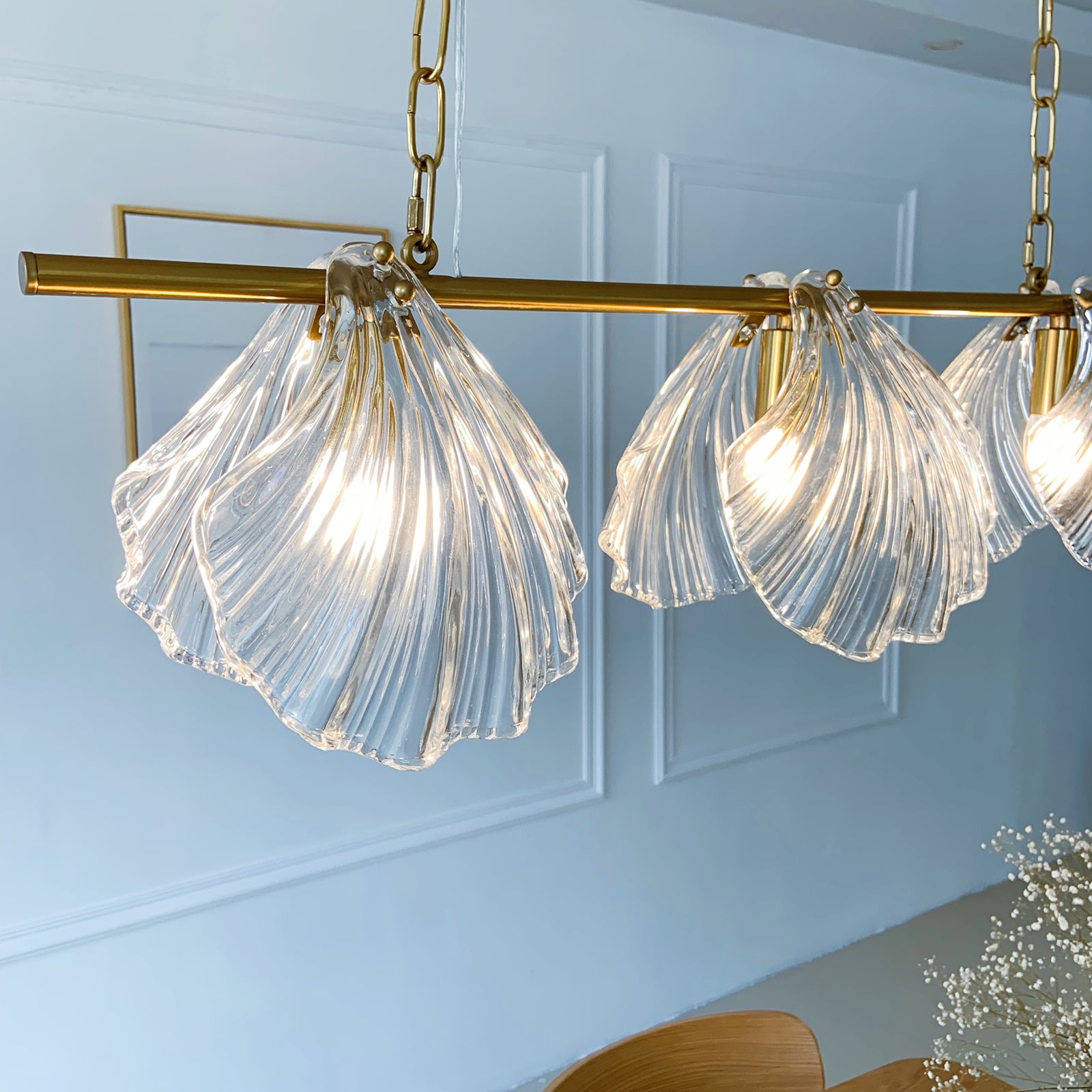 Chandelier with shell-shaped glass lights