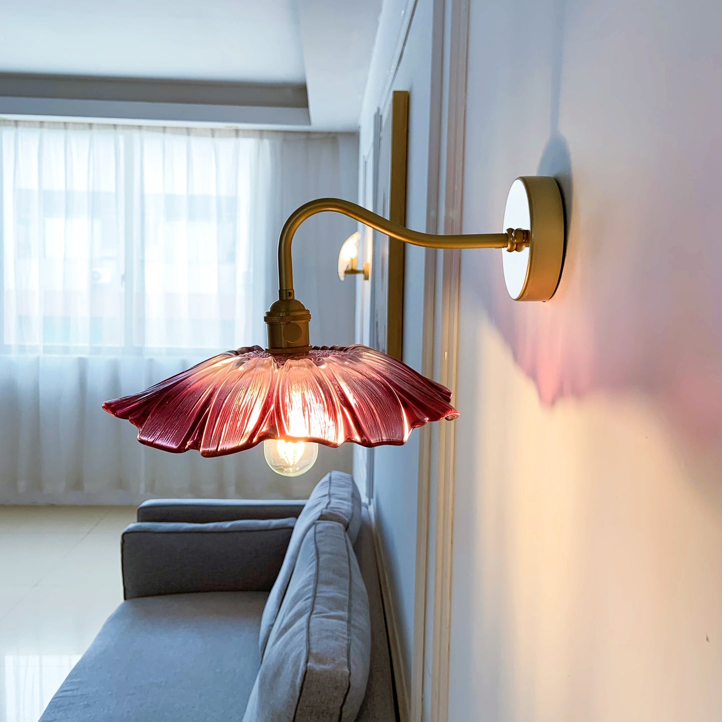 Glass sconce light with brass hardware ideal for hallway corridor and entryway